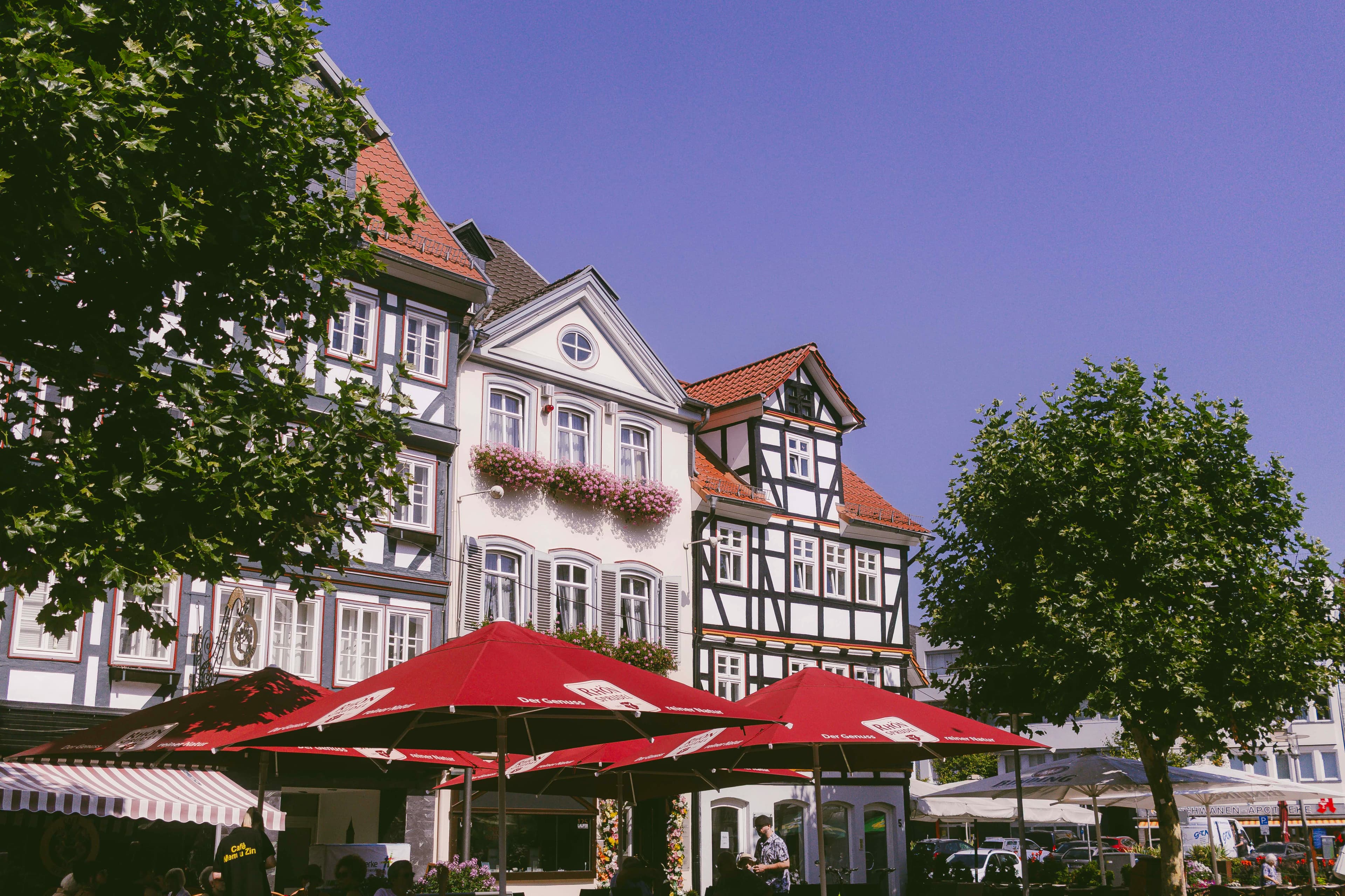 Half-timbered houses with outdoor cafe seating