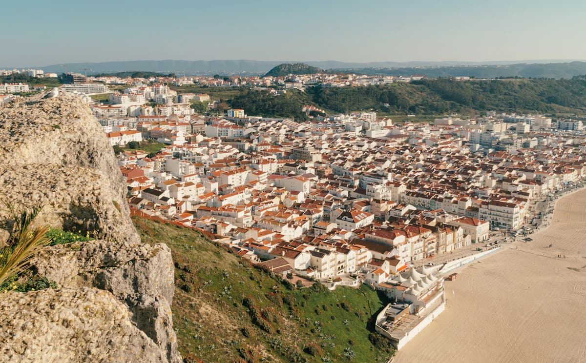 aerial view of city buildings on mountain during daytime