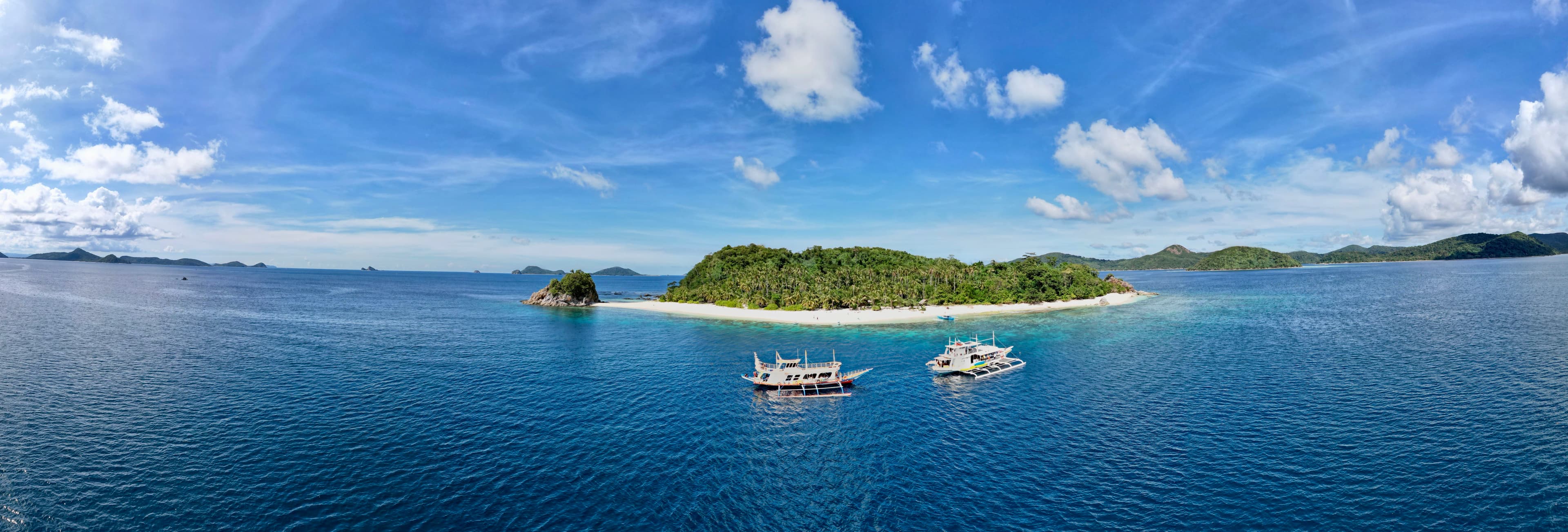 A small island in the middle of a body of water