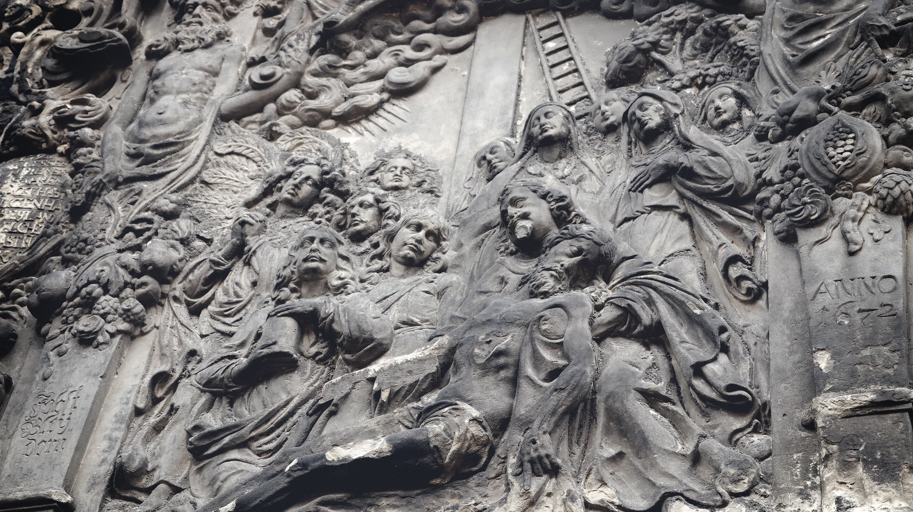 Sculpted relief of figures.