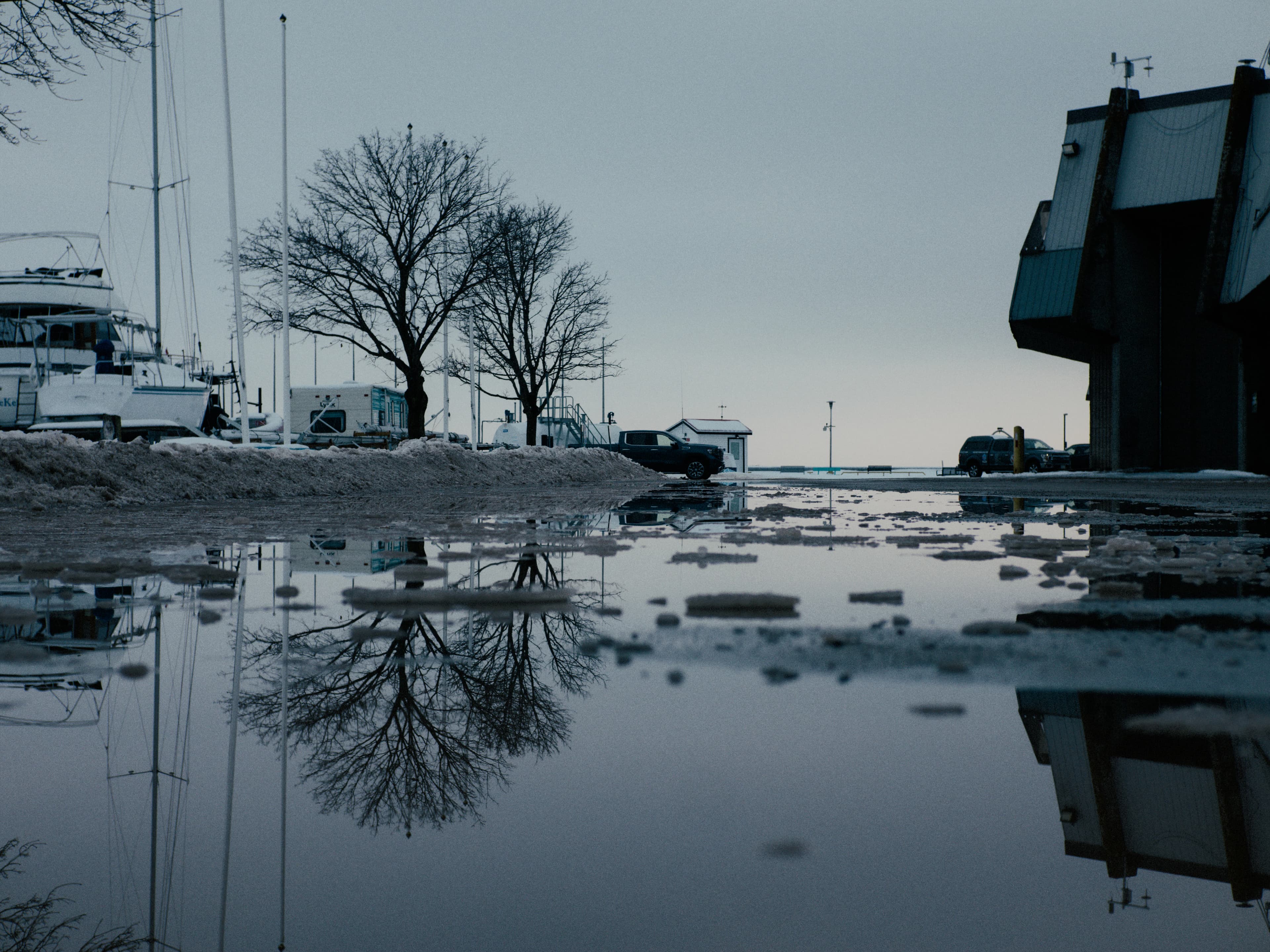Winter scene with reflections in water