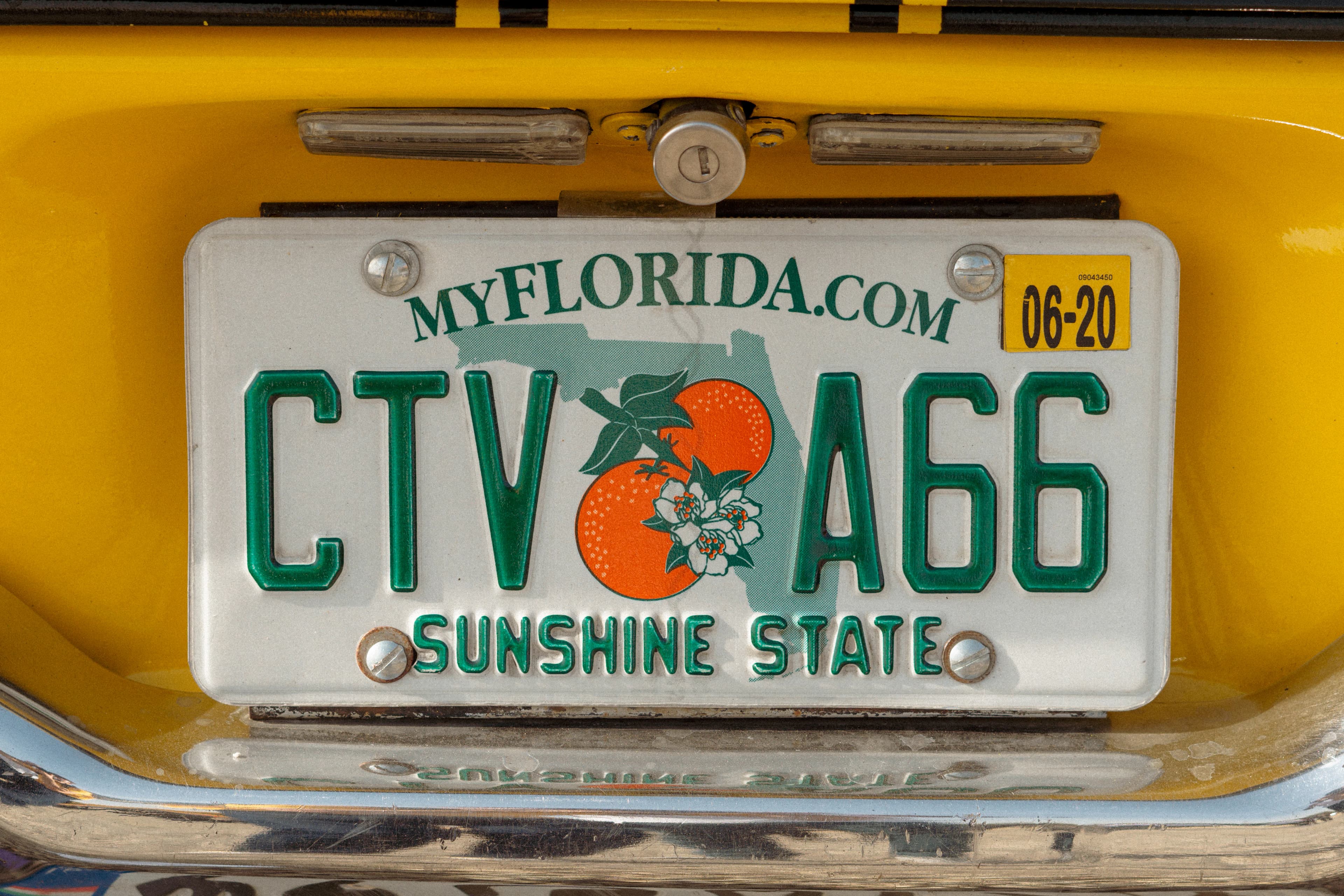 Florida license plate on a yellow car