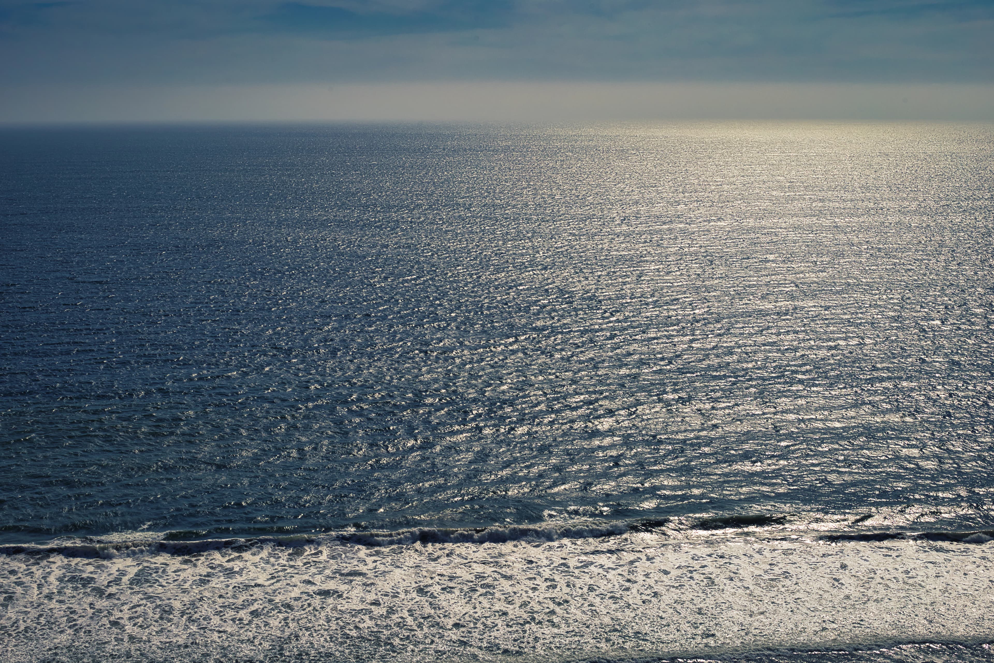 a view of the ocean from a high point of view