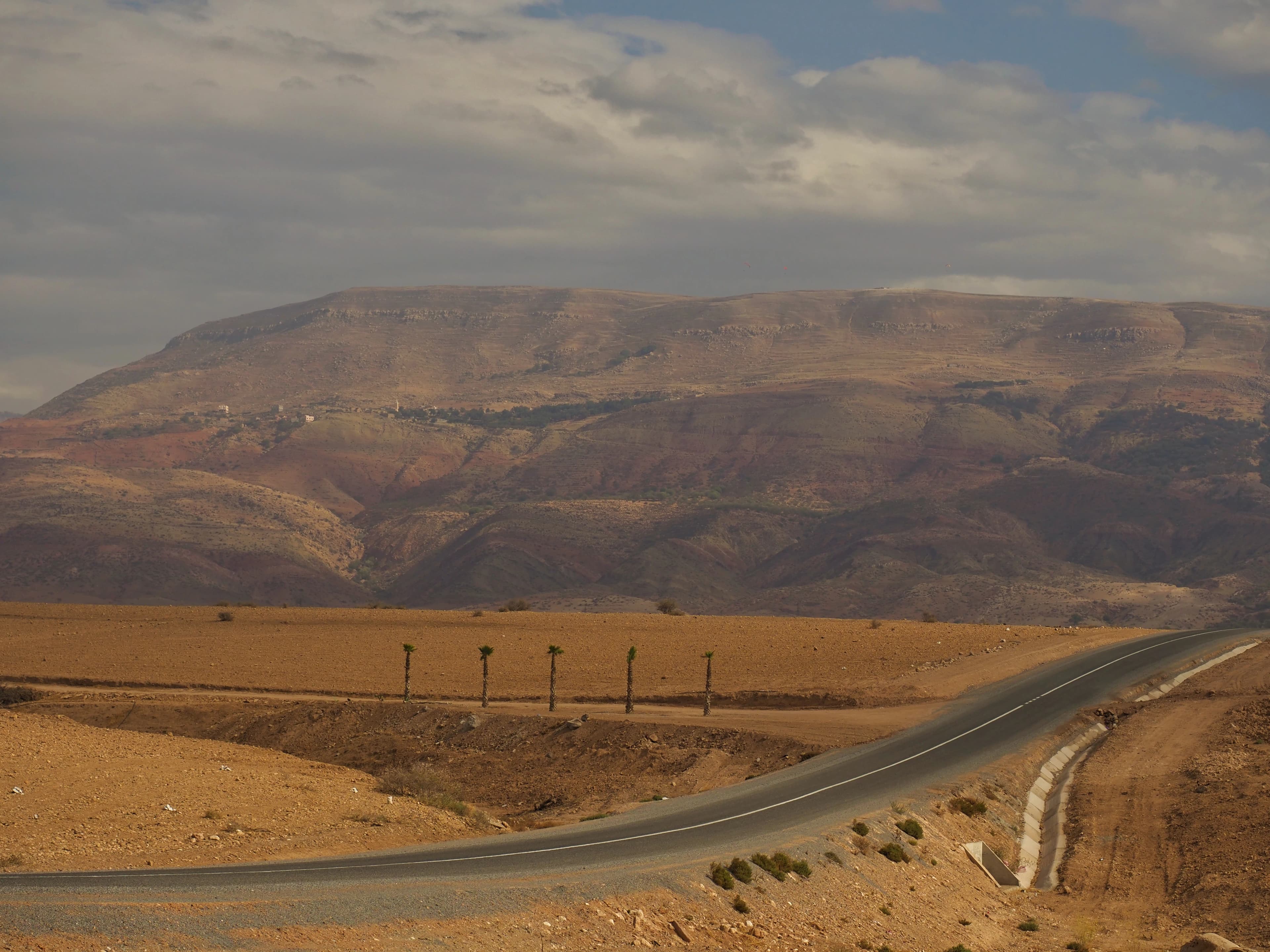 A winding road in the middle of a desert