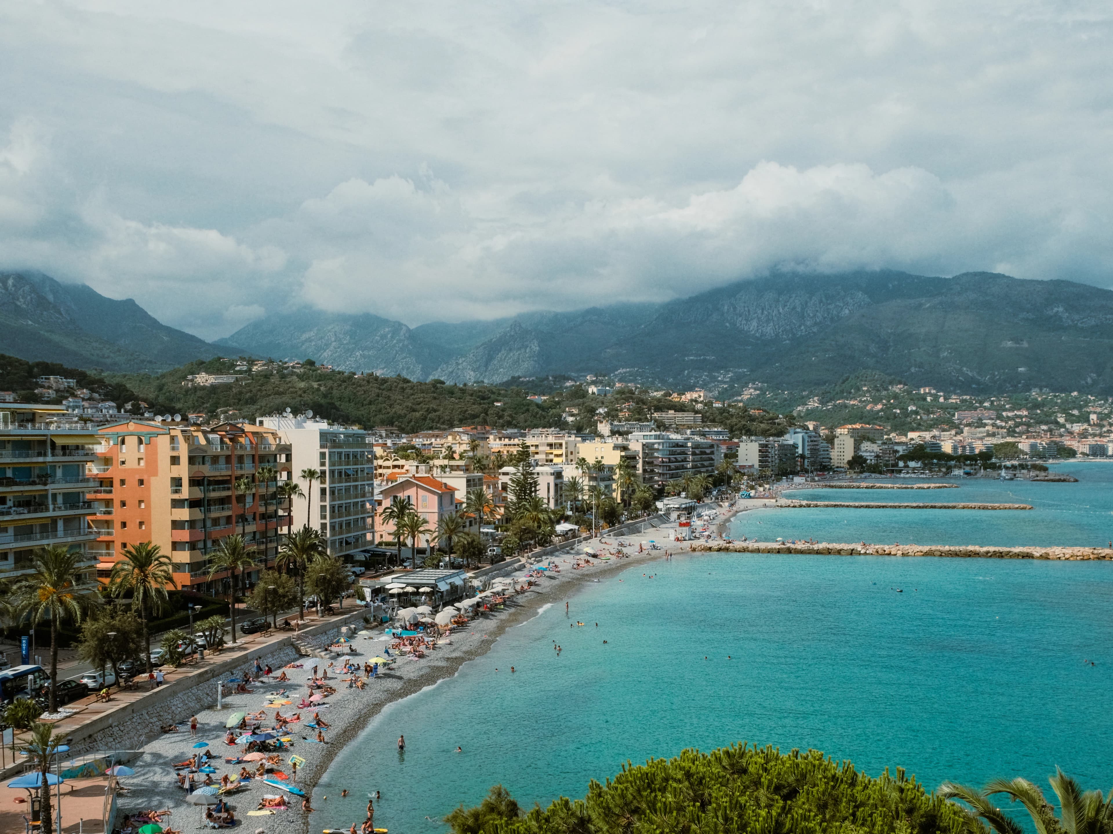 a beach with a bunch of cars parked on it